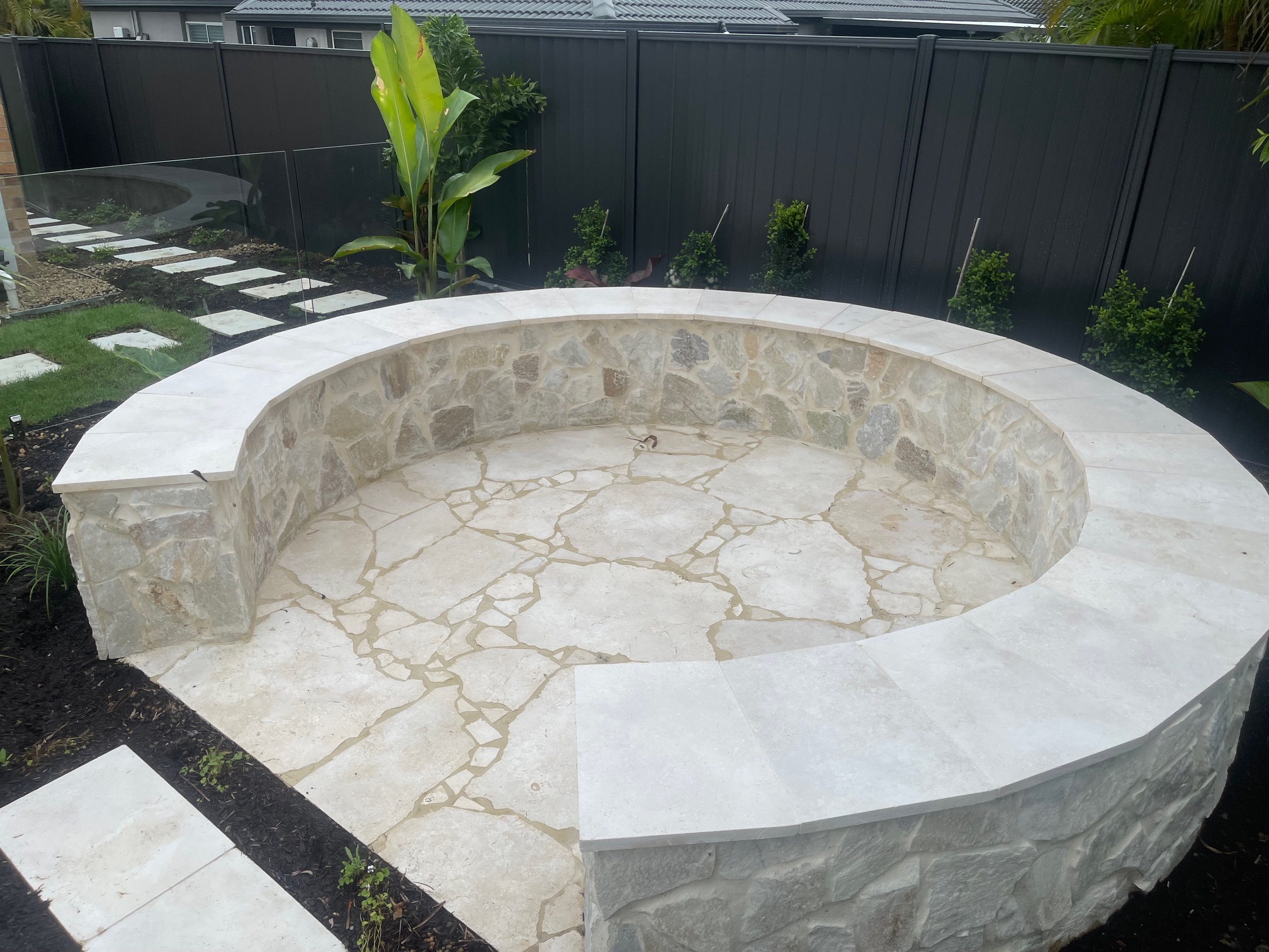 Curved stone feature seating area